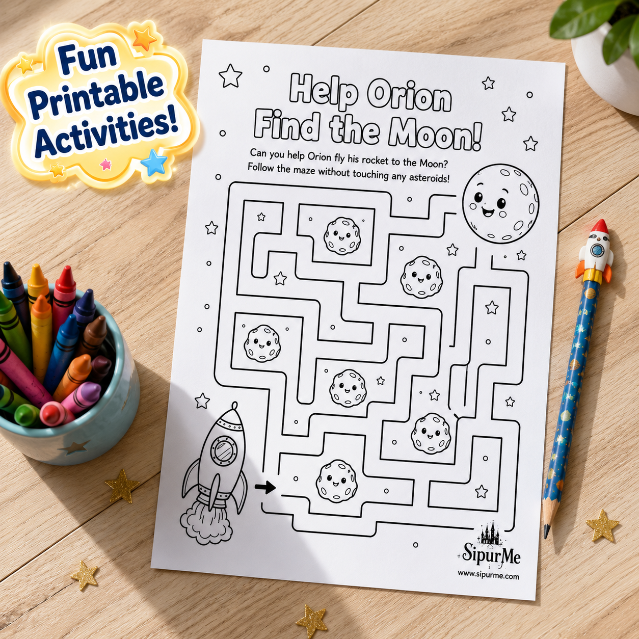 A printable children's activity sheet titled 'Help Orion Find the Moon!' laid on a wooden surface, surrounded by crayons, a pencil, and star confetti. The sheet shows a black-and-white moon maze with cartoon moon faces, stars, a rocket, and the SipurMe logo at the bottom.